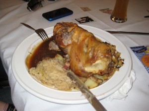 Saritas meal; a pork knuckle with fried potatoes and Sauerkraut